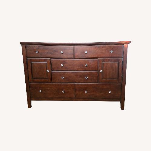 Used Vintage/Antique Dark Brown Wood Dresser for sale on AptDeco