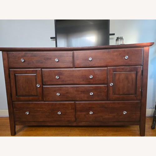 Used Vintage/Antique Dark Brown Wood Dresser for sale on AptDeco