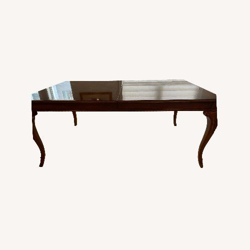 Used Thomasville Dining Table With 2 Leaves for sale on AptDeco