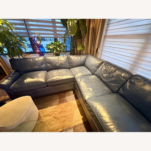 Used 2 Piece Blue Leather Sectional Couch for sale on AptDeco
