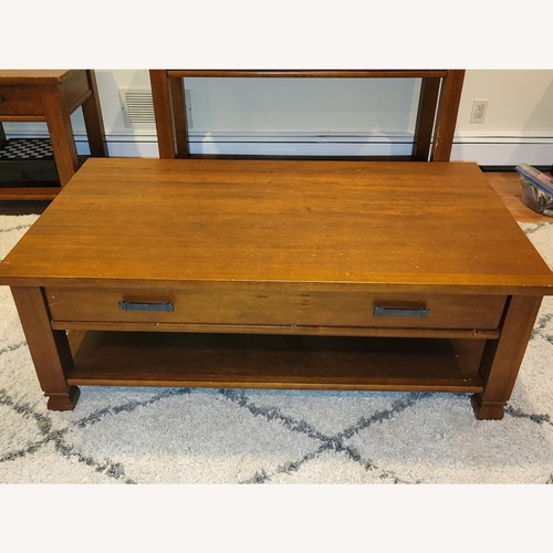 Used Pottery Barn Dark Brown Coffee Table for sale on AptDeco