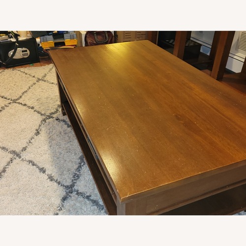 Used Pottery Barn Dark Brown Coffee Table for sale on AptDeco