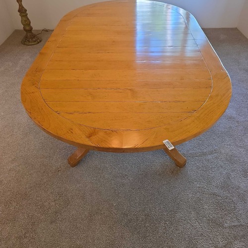 Used Bausman & Company Solid Wood Oval Dining Table for sale on AptDeco