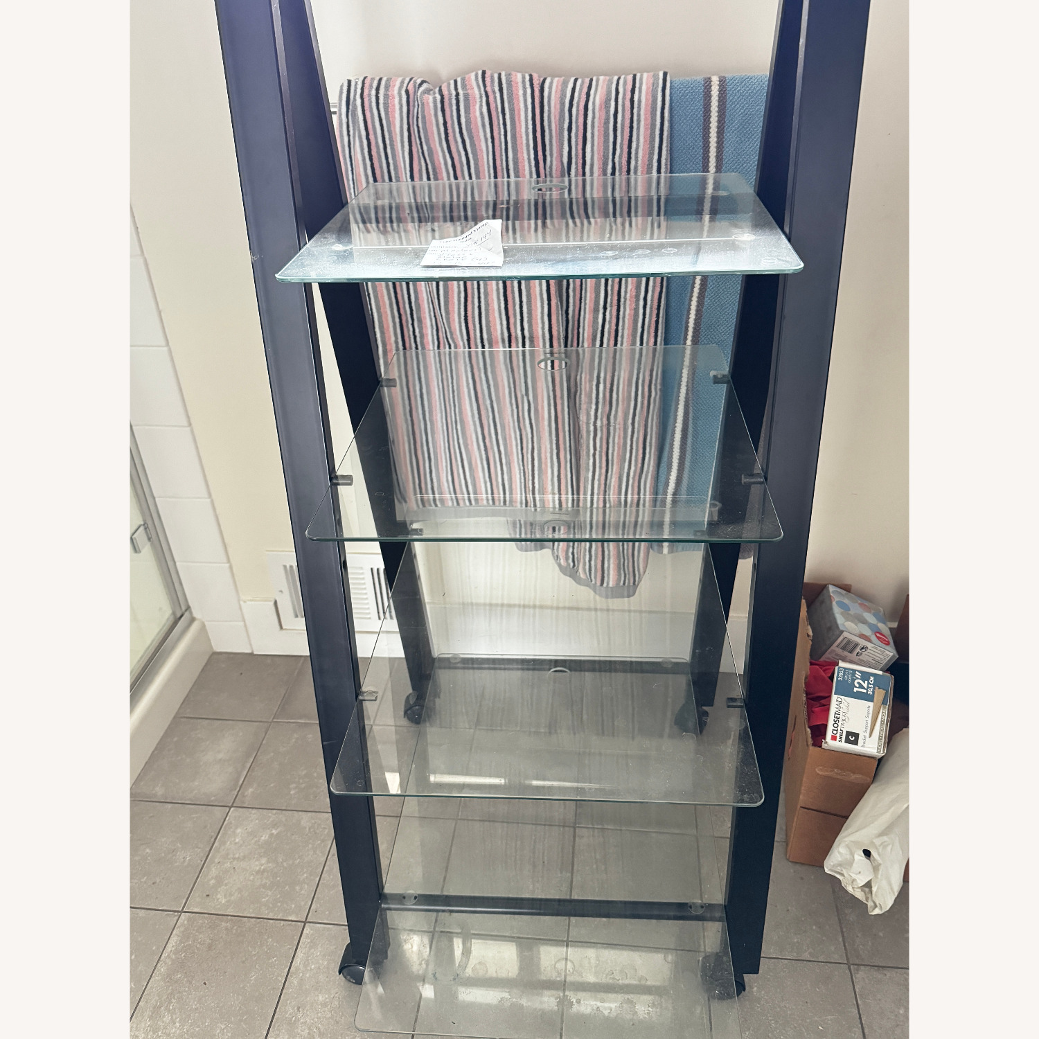 Black Metal and Glass Shelves With Wheels - image-0