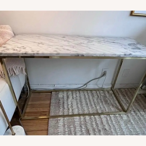 Used Donny Osmond Isabelle Marble Sofa Table with Brushed Brass Legs in White for sale on AptDeco