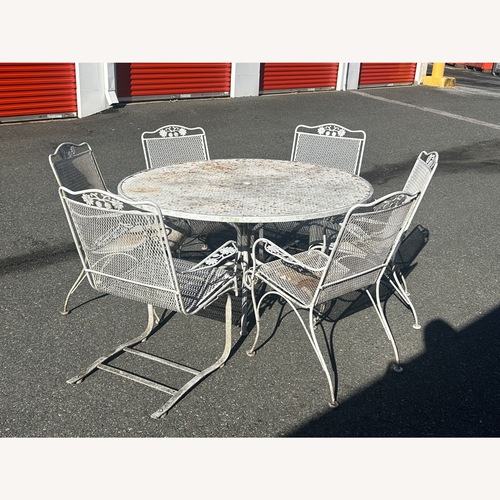 Used Vintage Woodard Patio Table & 6 Chairs for sale on AptDeco