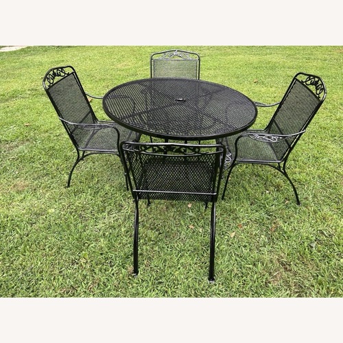 Used Vintage Woodard Table & 4 Decorative Chairs  for sale on AptDeco