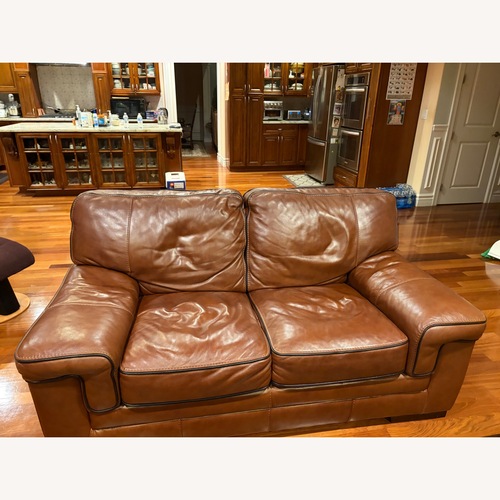 Used Macy's Myars Leather Loveseat  for sale on AptDeco