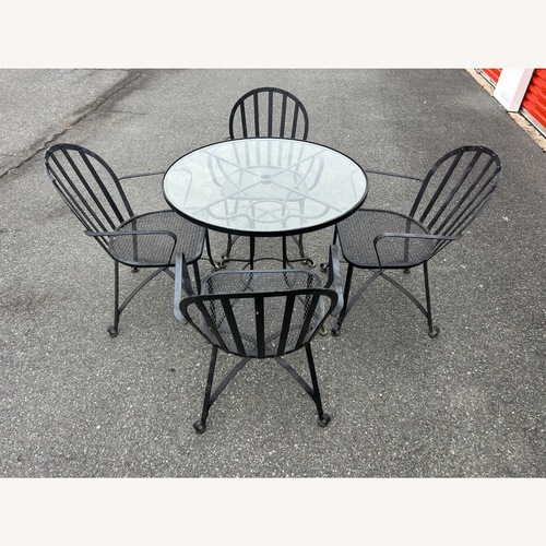 Used Woodard Vintage Glass Table & 4 Chairs for sale on AptDeco