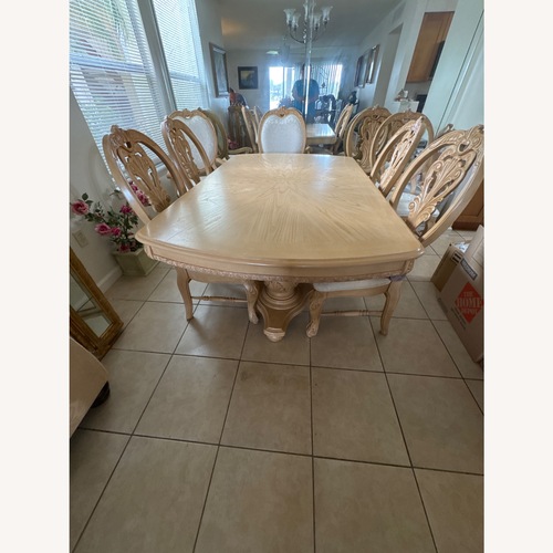 Used Lange Production Natural Wood Dining Set for sale on AptDeco