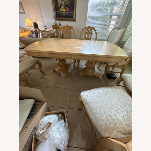 Used Lange Production Natural Wood Dining Set for sale on AptDeco