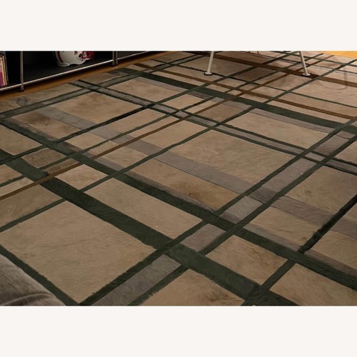 Used Light Gray Fur and Hide Area Rug 12' x 14' for sale on AptDeco