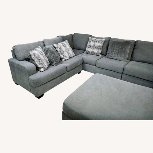 Used Ashley Furniture Sectional with Chaise and Ottoman for sale on AptDeco