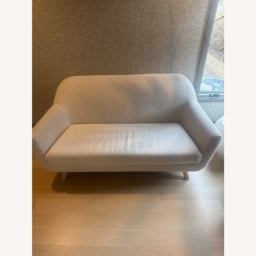 Used Article Gabriola White Boucle Loveseat for sale on AptDeco