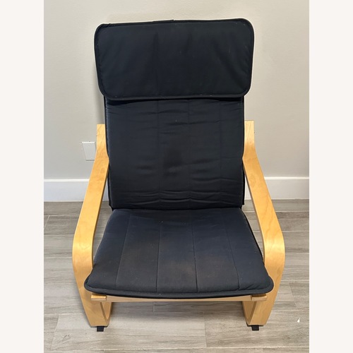 Used IKEA Light Brown Wood Armchair for sale on AptDeco