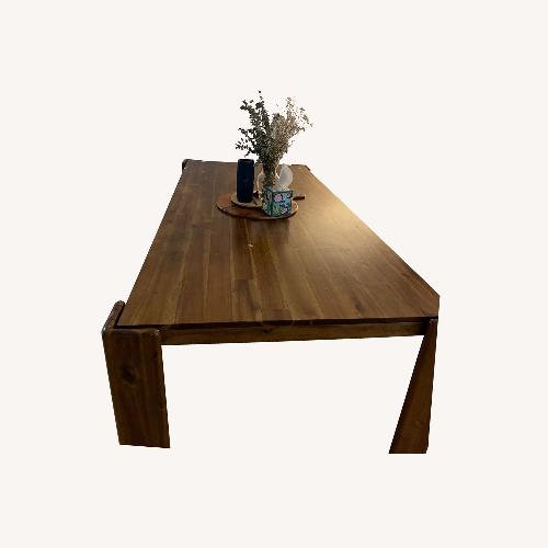 Used Create Comfort Dark Brown Wood Dining Table for sale on AptDeco