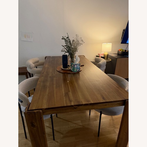 Used Create Comfort Dark Brown Wood Dining Table for sale on AptDeco