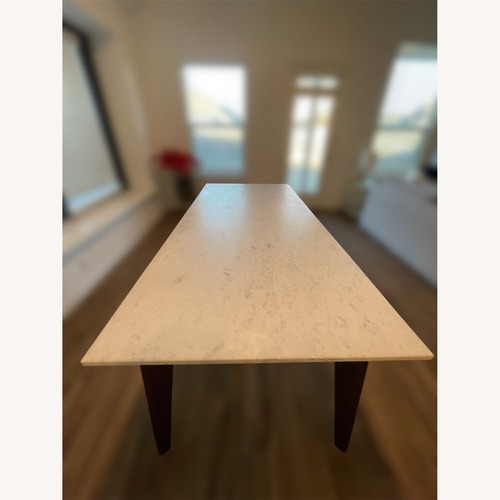 Used CB2 White Marble Dining Table for sale on AptDeco