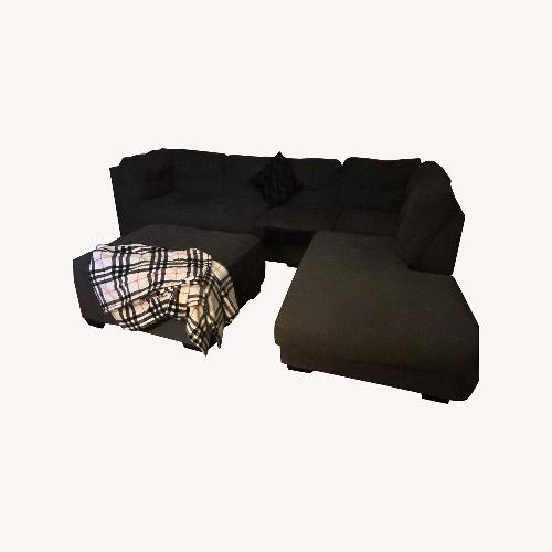 Used Raymour & Flanigan Dark Gray 3+ Piece Sectional for sale on AptDeco