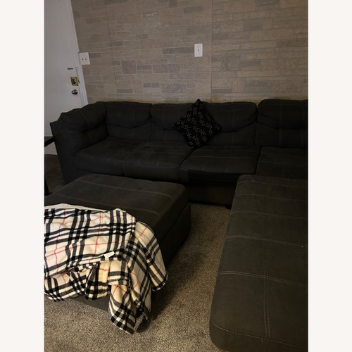 Used Raymour & Flanigan Dark Gray 3+ Piece Sectional for sale on AptDeco
