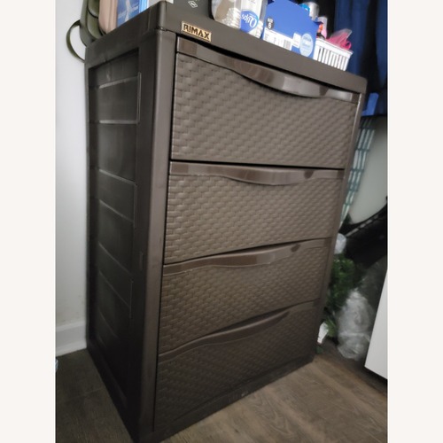 Used Dark Brown Plastic Armoire for sale on AptDeco