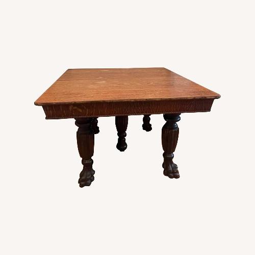 Used Dark Brown Wood Dining Table for sale on AptDeco
