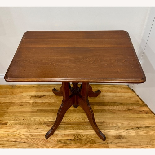 Used Vintage Antique Dark Brown Wood Pedestal Table for sale on AptDeco