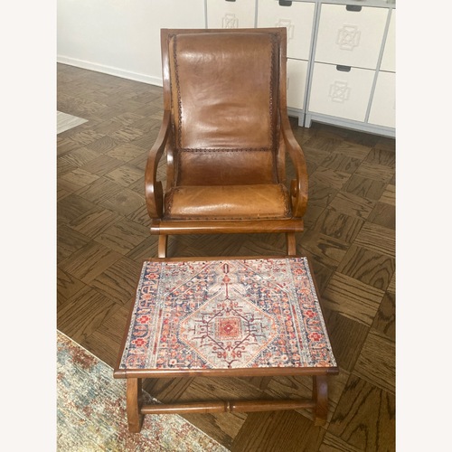 Used Light Brown Leather Armchair with Foot Stool for sale on AptDeco