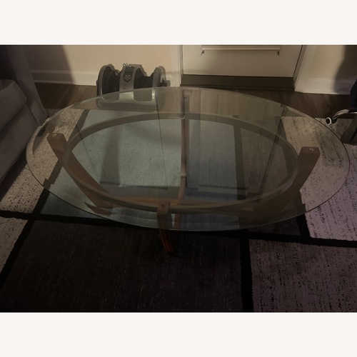 Used Dark Brown Glass Coffee Table for sale on AptDeco