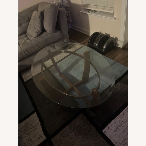 Used Dark Brown Glass Coffee Table for sale on AptDeco