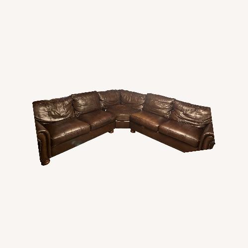 Used Brown Leather Sectional Sofa for sale on AptDeco