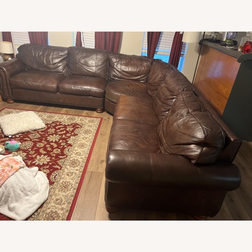 Used Brown Leather Sectional Sofa for sale on AptDeco