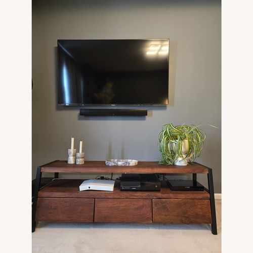 Used Dark Brown Wood Media Center Unit for sale on AptDeco