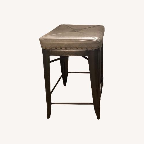 Used Home Goods Dark Gray Faux Leather Stools for sale on AptDeco