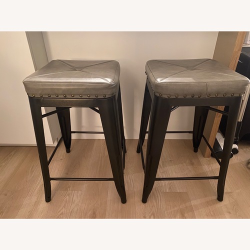 Used Home Goods Dark Gray Faux Leather Stools for sale on AptDeco
