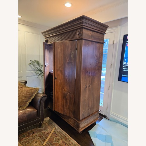 Used ABC Carpet and Home Dark Brown Armoire for sale on AptDeco