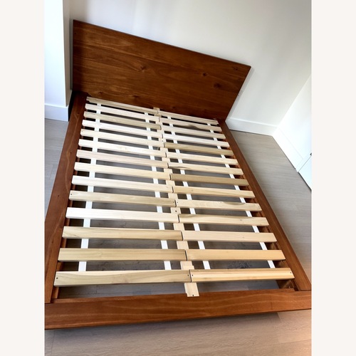 Used CB2 Dark Brown Wood Queen Bed for sale on AptDeco