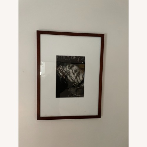 Used Brown Wood Wall Art/Portrait of Charlotte Ramplin for sale on AptDeco