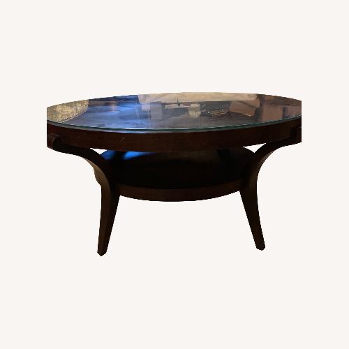 Used Round Brown Wood Coffee Table w Glass Top for sale on AptDeco