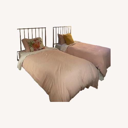 Used Pink Metal Twin Bed for sale on AptDeco