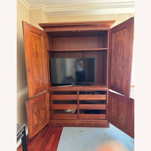 Used Taylor Made Custom Solid Wood Armoire/ TV Cabinet for sale on AptDeco