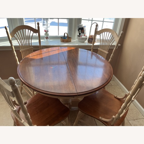 Used Light Brown Wood Dining Table for sale on AptDeco