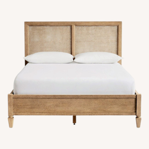 Used Pottery Barn Sausalito Cane Queen Bed for sale on AptDeco