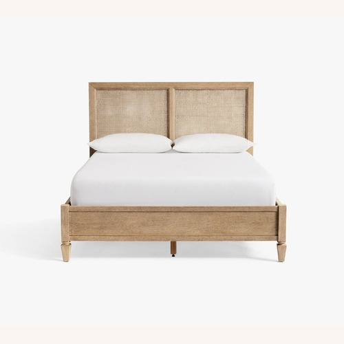 Used Pottery Barn Sausalito Cane Queen Bed for sale on AptDeco