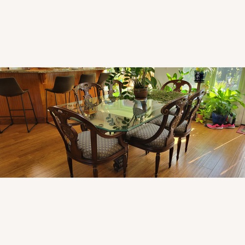 Used Luxe Home Glass Dining Table with 6 Chairs for sale on AptDeco