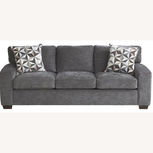 Used Rooms To Go Dark Gray Fabric 3+ Piece Sectional for sale on AptDeco