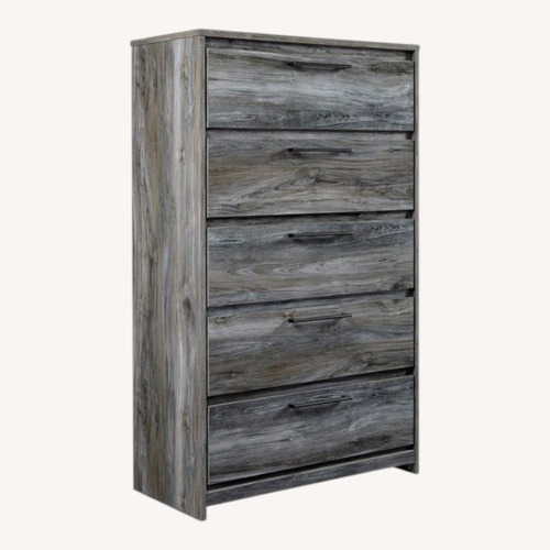 Used Ashley Baystorm Dark Gray Wood Chest for sale on AptDeco