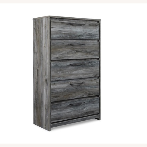 Used Ashley Baystorm Dark Gray Wood Chest for sale on AptDeco