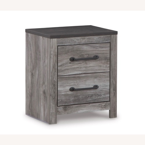 Used Ashley Furniture Dark Gray Wood Nightstand for sale on AptDeco