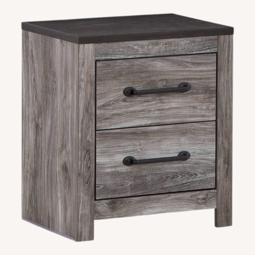 Used Ashley Furniture Dark Gray Wood Nightstand for sale on AptDeco